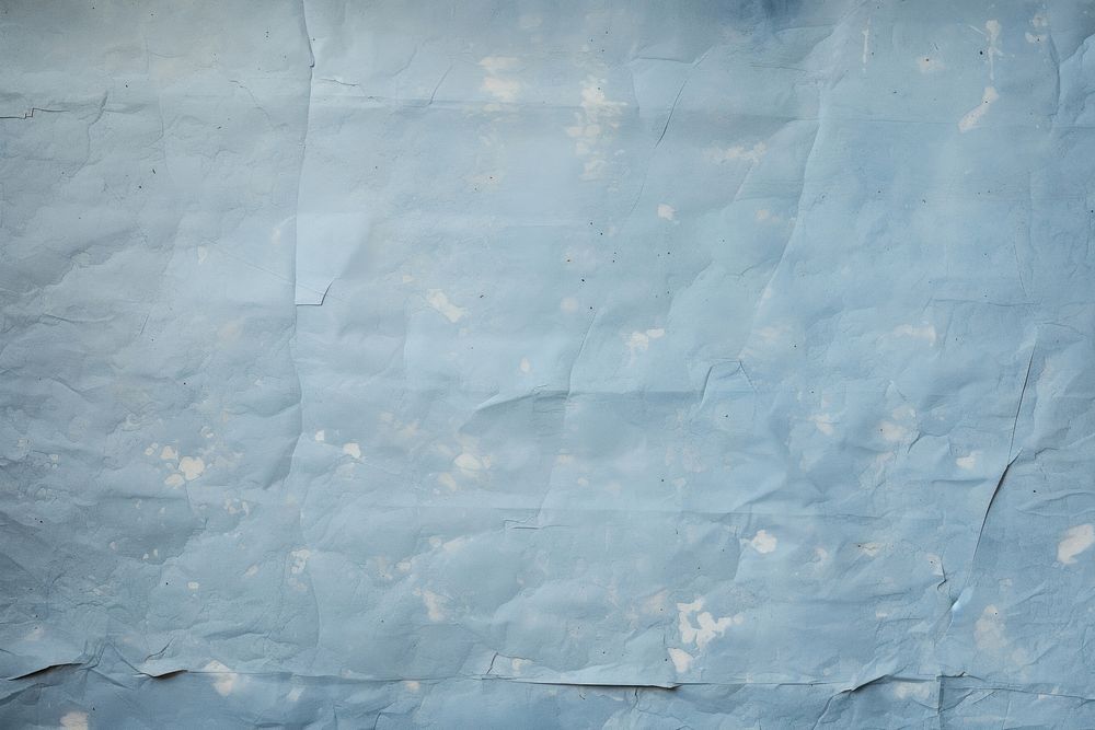 Ripped Blue paper backgrounds texture.