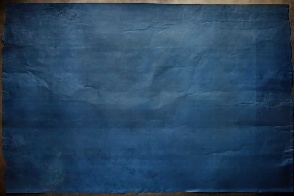 Dark blue paper Faded paper backgrounds texture.