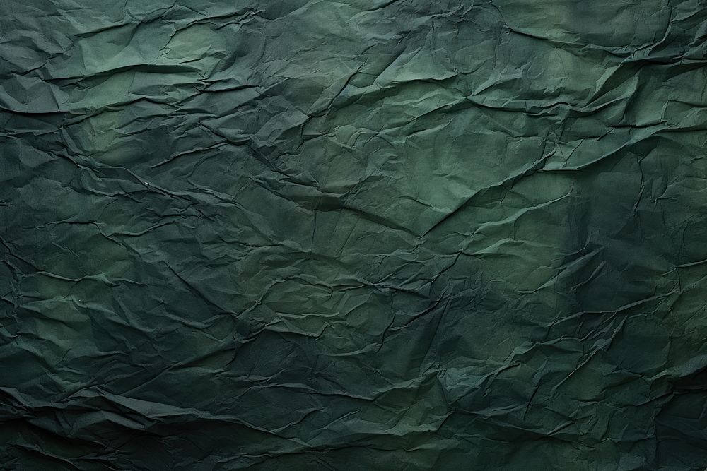Crumpled Dark green paper Drawing paper backgrounds.