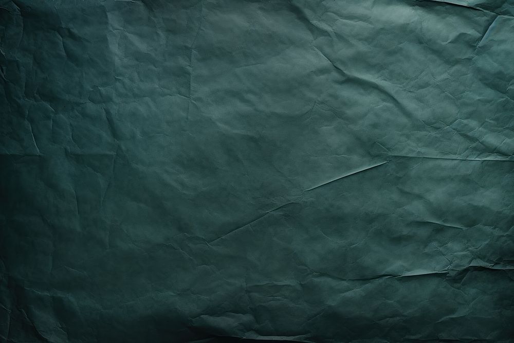 Crumpled Dark green paper Drawing paper backgrounds.