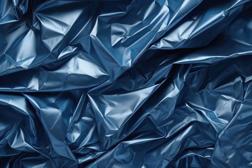  Blue foil texture backgrounds crumpled wrinkled. AI generated Image by rawpixel.