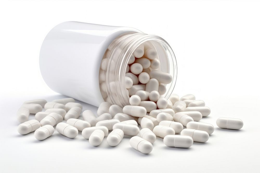 A medicine bottle filled with white medicine capsules pill white background medication. AI generated Image by rawpixel.