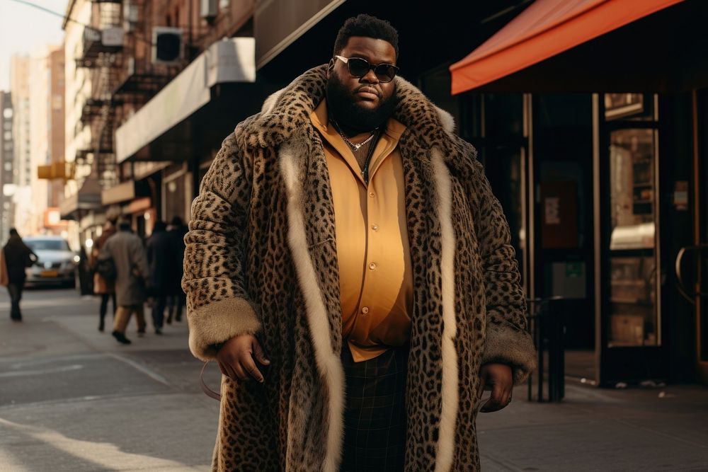 Fat black man fashion street coat city.