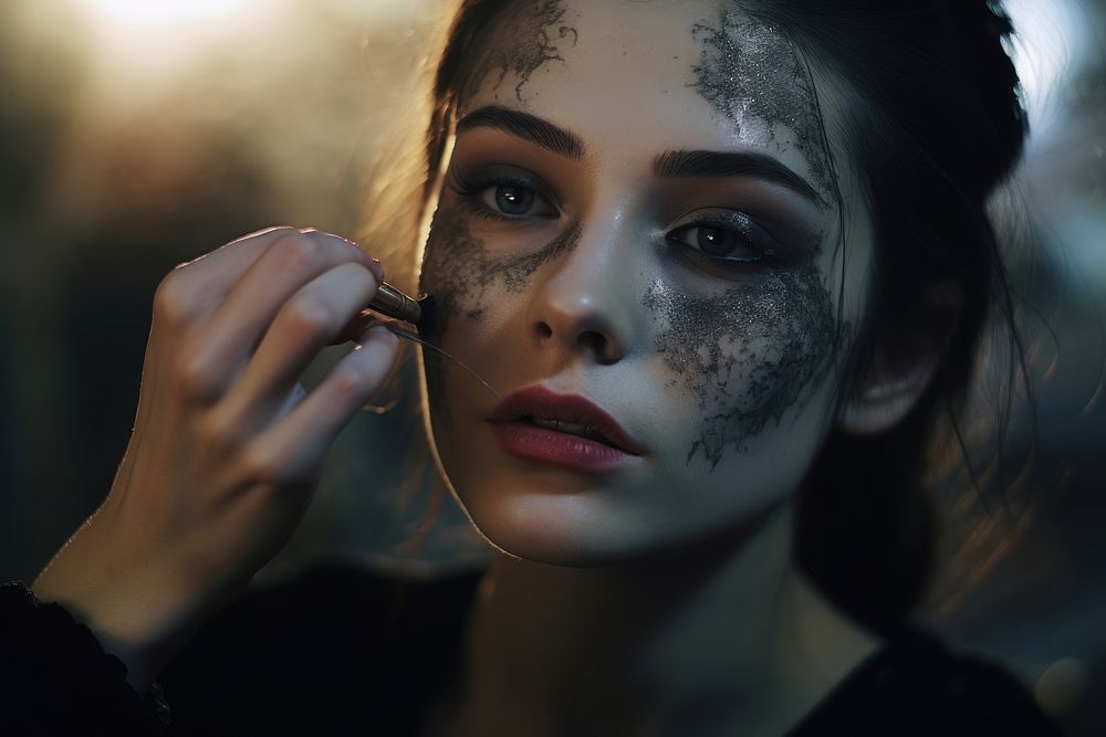 Girl doing makeup portrait adult photo.