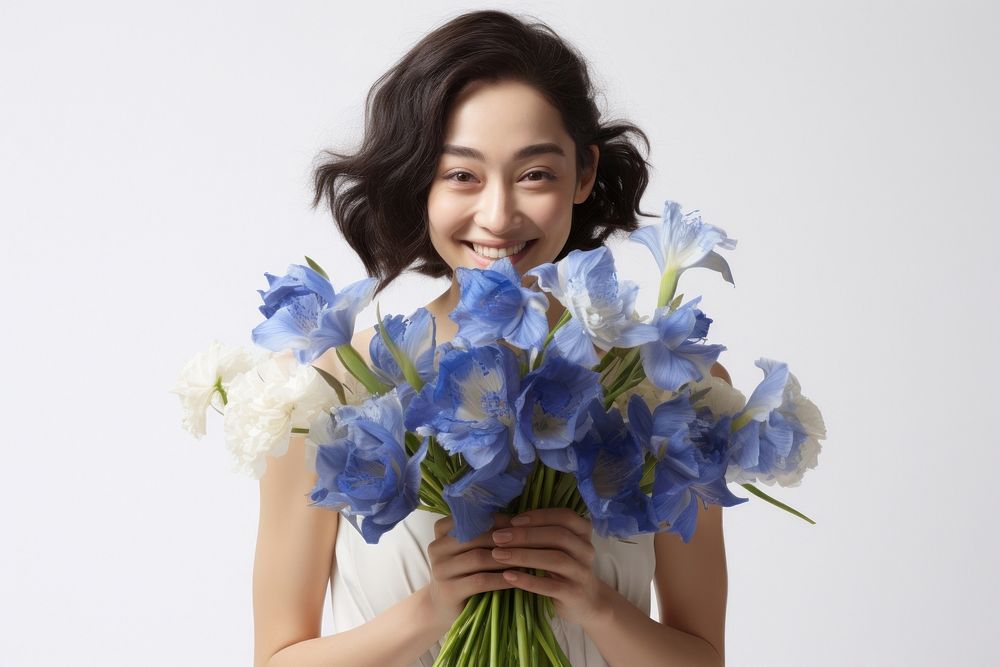 Happy bride holding a blue iris flower bouquet portrait adult plant.