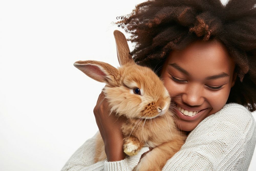 African-American woman hugging a rabbit portrait mammal animal.