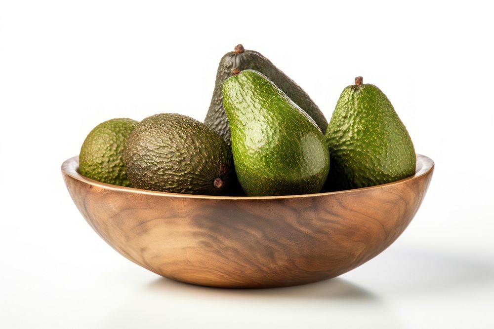Avocado fruits in a wooden bowl plant food pear.