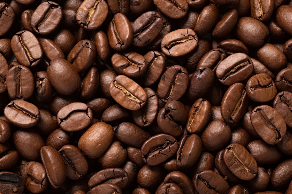  Coffee beans texture coffee food coffee beans. AI generated Image by rawpixel.