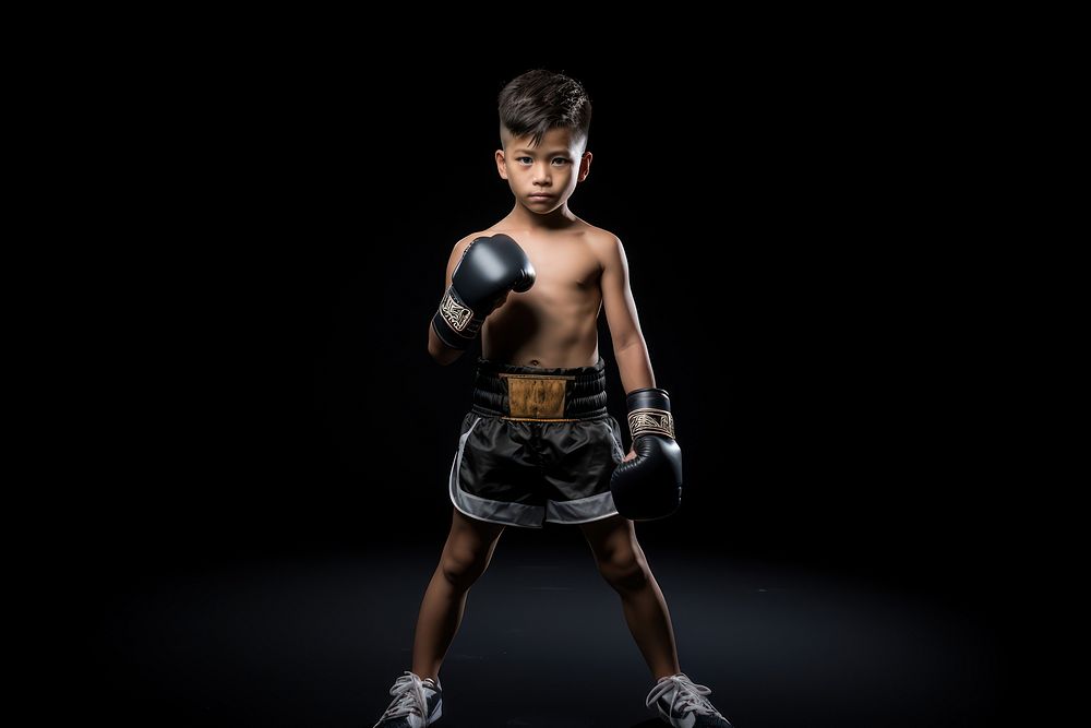 Thai kid boxing punching sports.