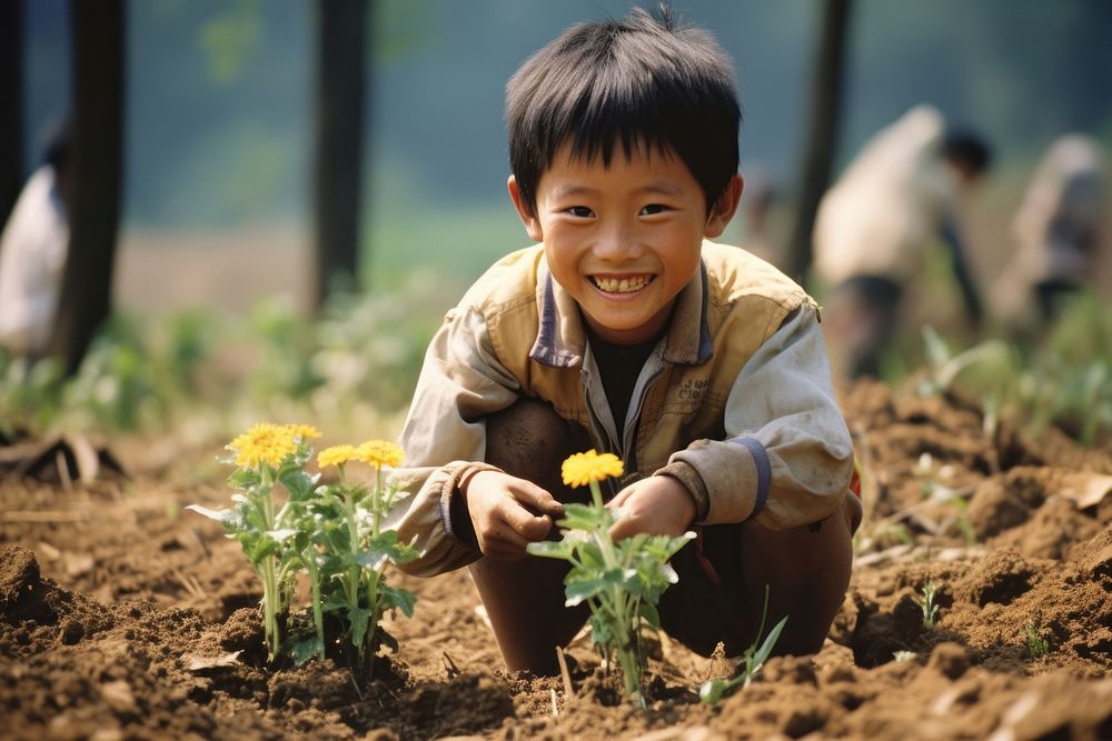 Vietnamese kid flower plant gardening.