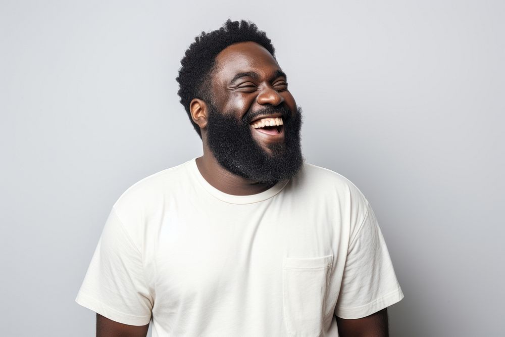 Black man cheerful portrait laughing.