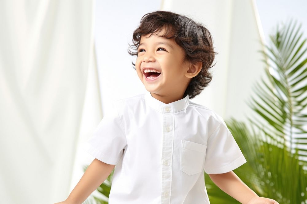 Singaporean child laughing smile white.