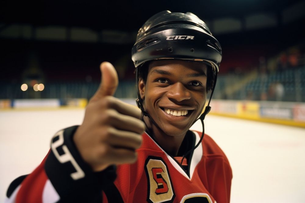 Hockey player portrait smiling helmet.