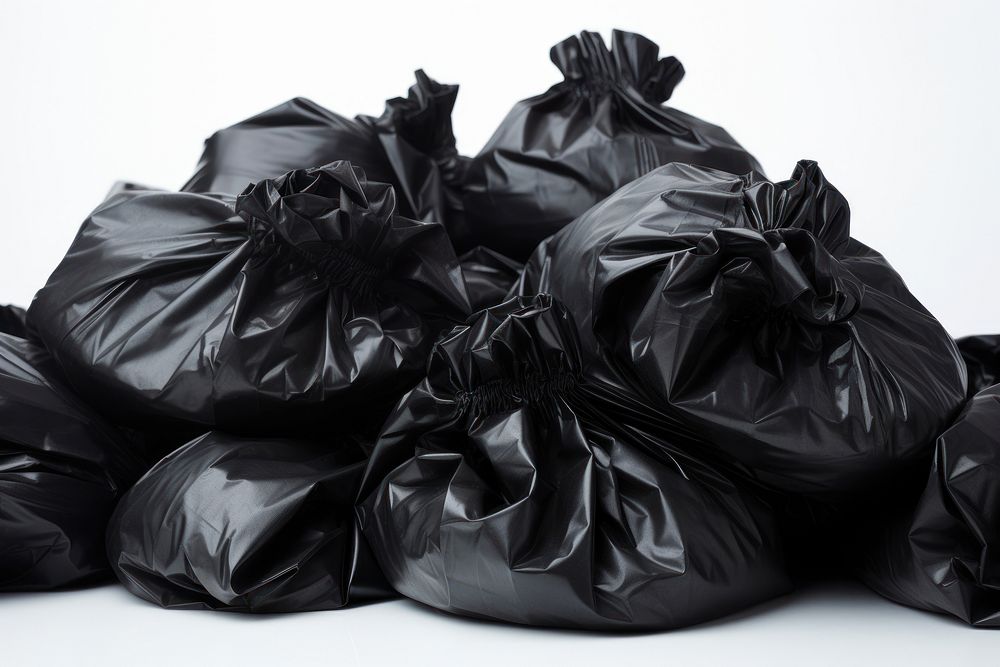 Black garbage bags plastic white background accessories.