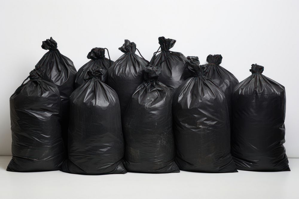 Black garbage bags plastic white background accessories.