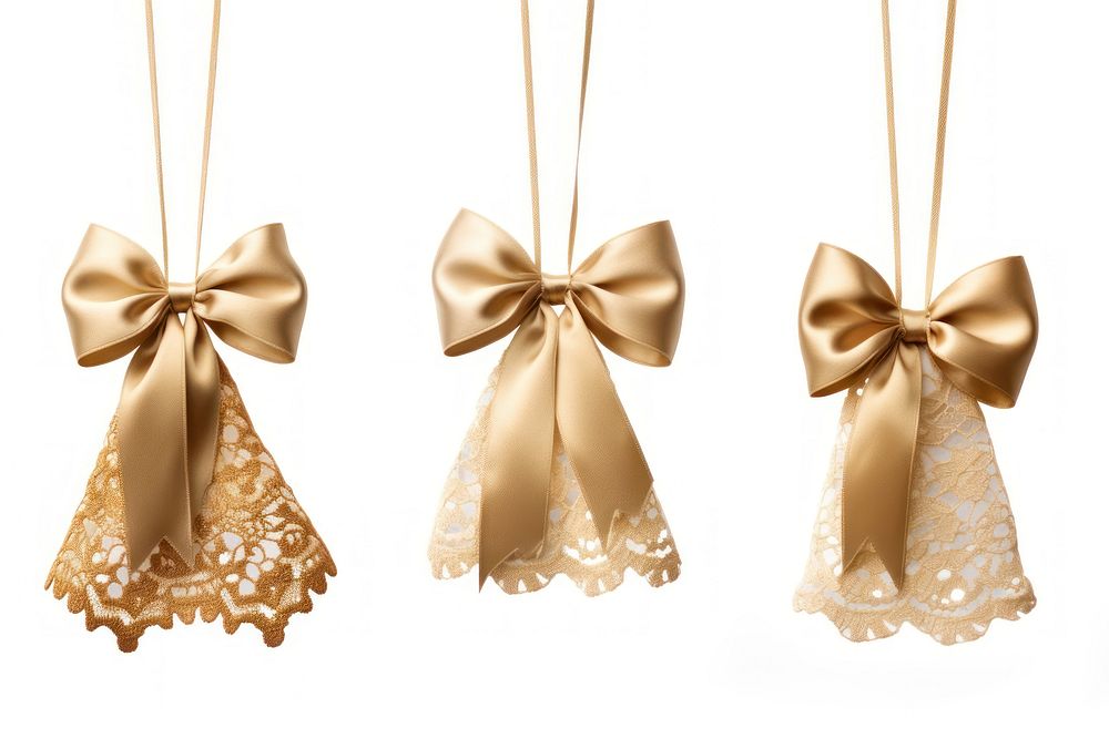 Golden lace ribbon bows jewelry hanging white.