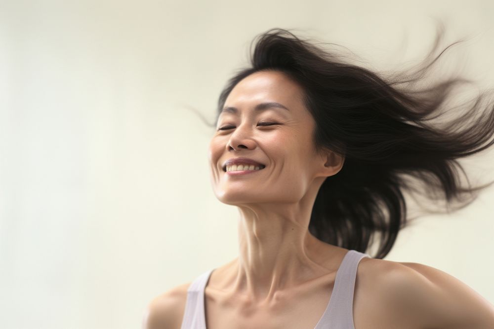 Mature asian american woman laughing smile adult. AI generated Image by rawpixel.