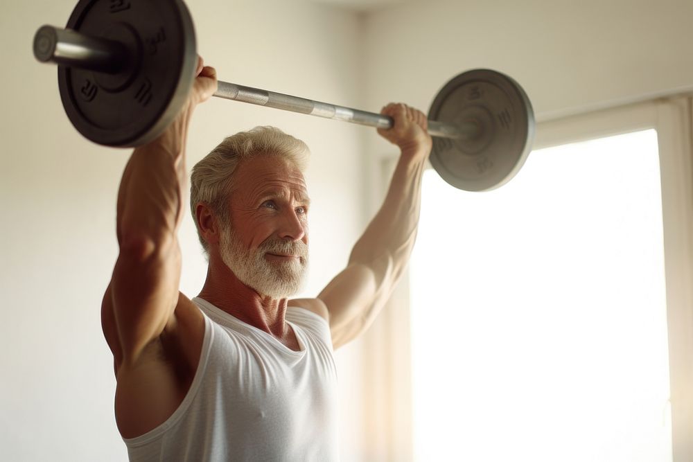Mature guy lifting weight sports adult gym. AI generated Image by rawpixel.