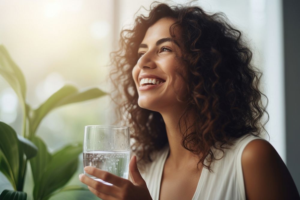 Woman drinking water laughing smile adult. AI generated Image by rawpixel.