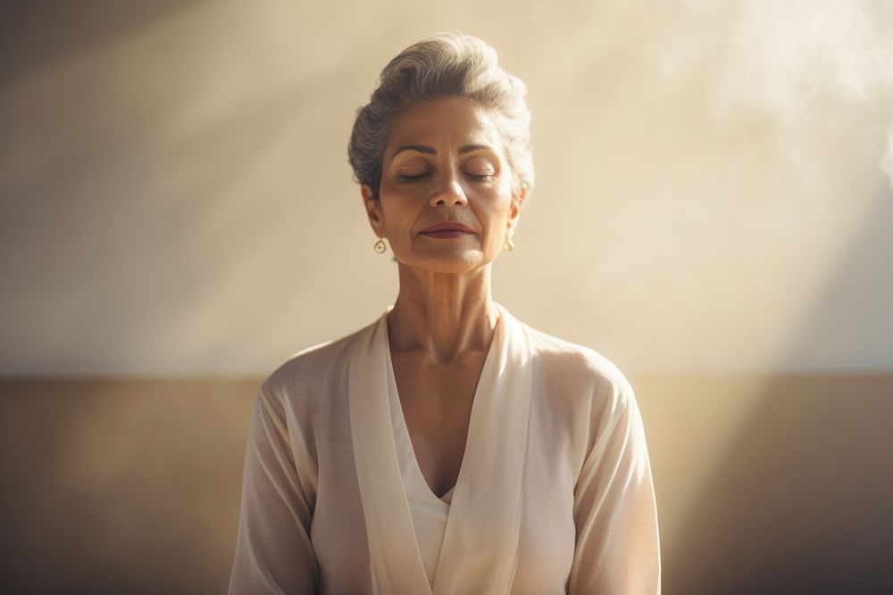Mature woman meditating portrait adult photo. AI generated Image by rawpixel.