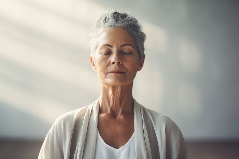 Mature woman meditating adult contemplation spirituality. AI generated Image by rawpixel.