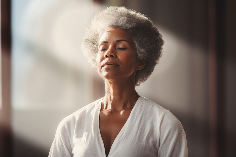 Mature woman meditating portrait adult photo. AI generated Image by rawpixel.