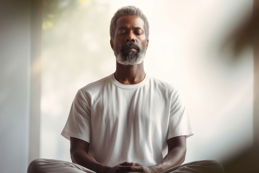 Mature guy meditating sitting sports adult. AI generated Image by rawpixel.
