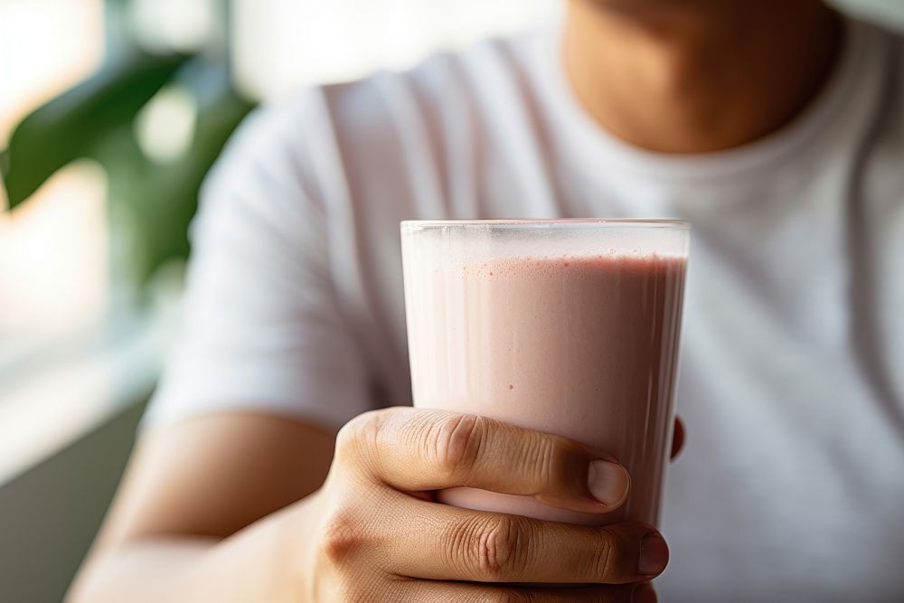 Asian american father drink smoothie drinking. 