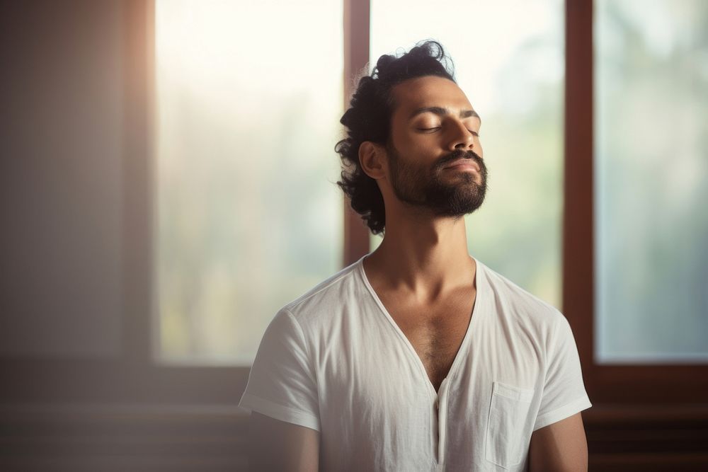 Indian guy does yoga adult contemplation spirituality. AI generated Image by rawpixel.