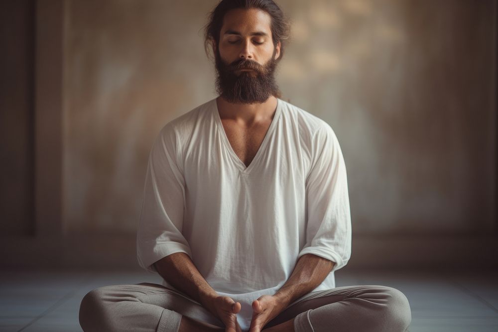 Indian guy does yoga sitting sports adult. AI generated Image by rawpixel.