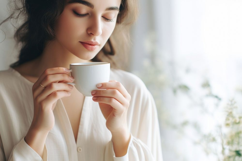 Woman sipping herbal tea cup mug contemplation. AI generated Image by rawpixel.