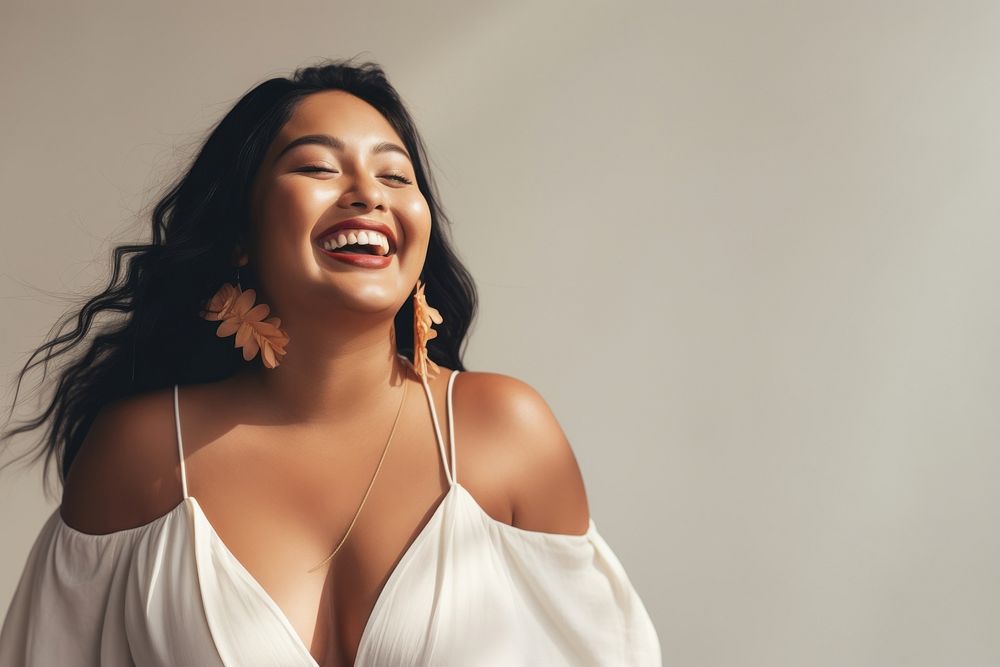 A chubby Pacific Islander woman in happy mood laughing smile happiness.