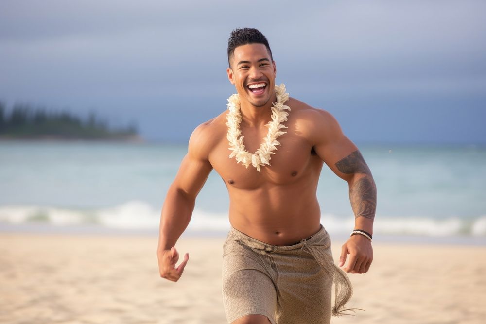 A muscular Pacific Islander male enjoy dance beach outdoors nature.