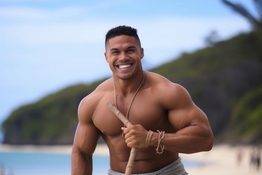 A muscular Tonga male enjoy dance adult smile beach.