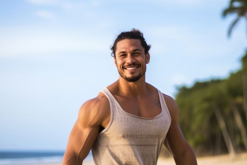 A muscular Tonga male enjoy dance beach smile adult.