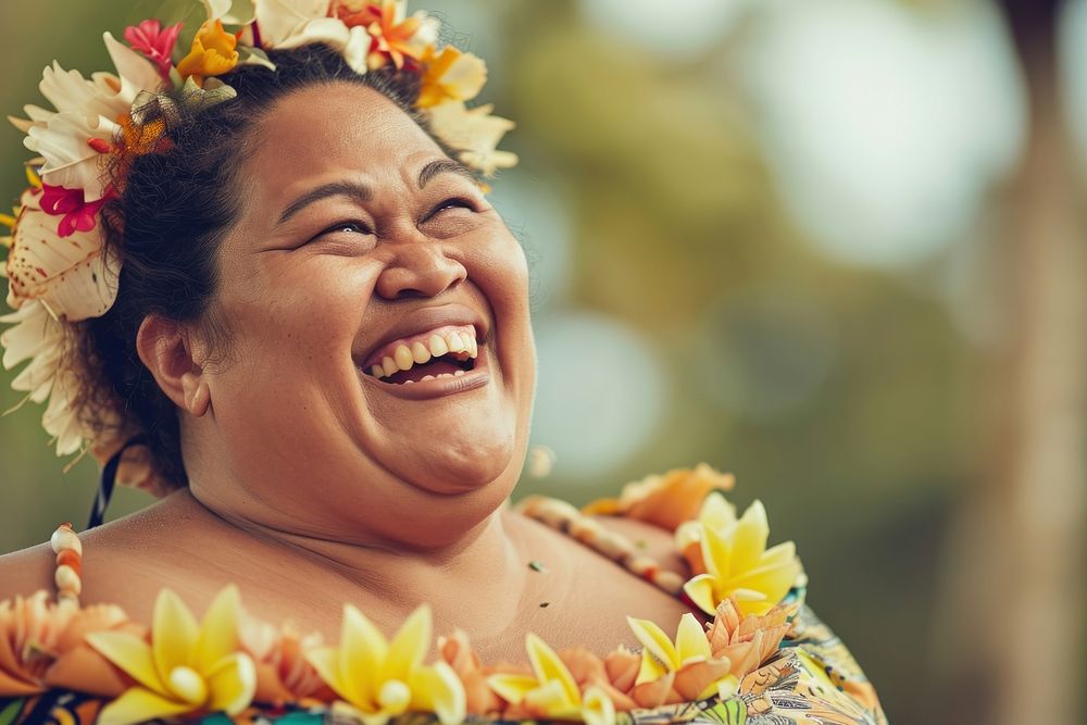 A chubby Tonga womans with cosmetic laughing flower smile.