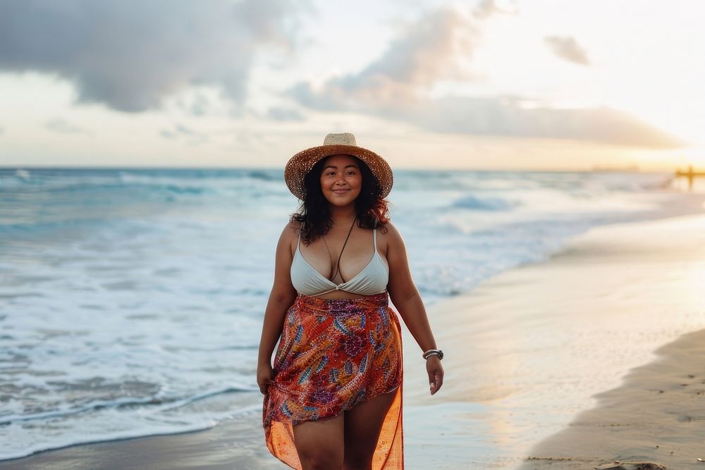 Chubby Pacific Islander woman walk on the beach outdoors adult day.