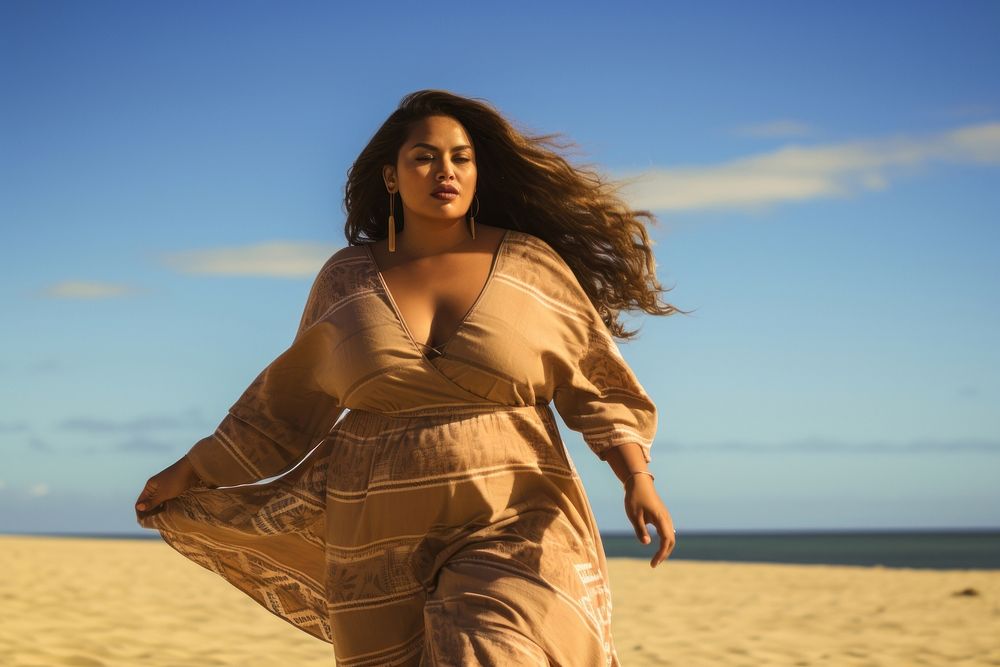 Chubby Pacific Islander woman walk on the beach outdoors portrait nature.