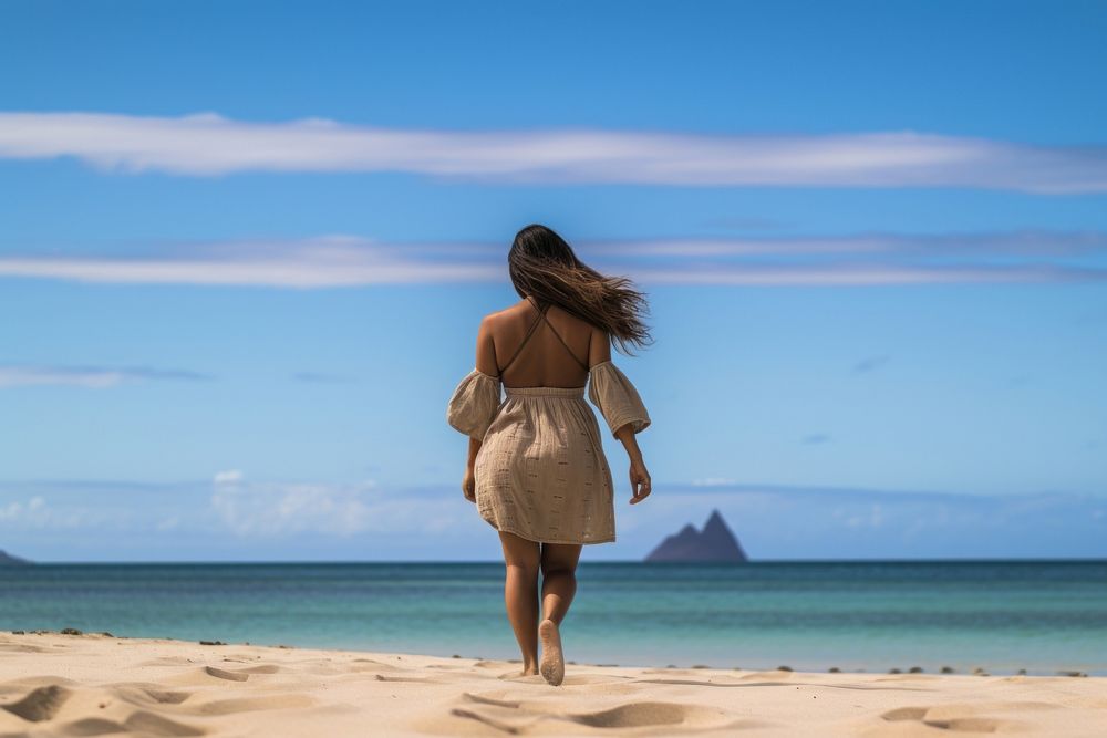 Chubby Pacific Islander woman walk on the beach outdoors vacation horizon.