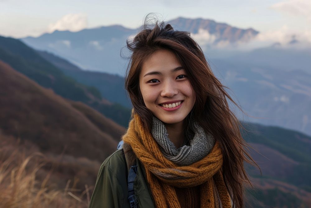 Asian woman mountain portrait smiling.