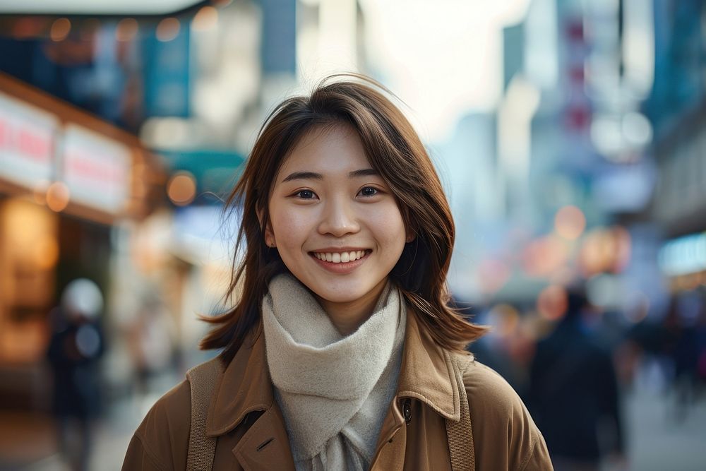 Asian woman portrait standing smiling.