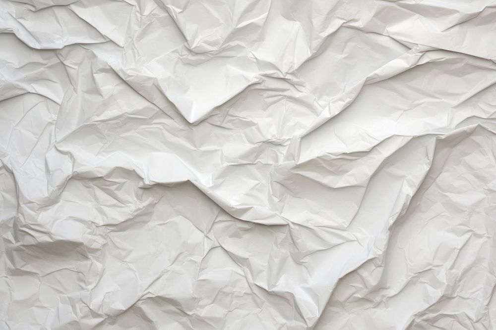 Crumpled Paper Texture paper backgrounds crumpled. AI generated Image by rawpixel.