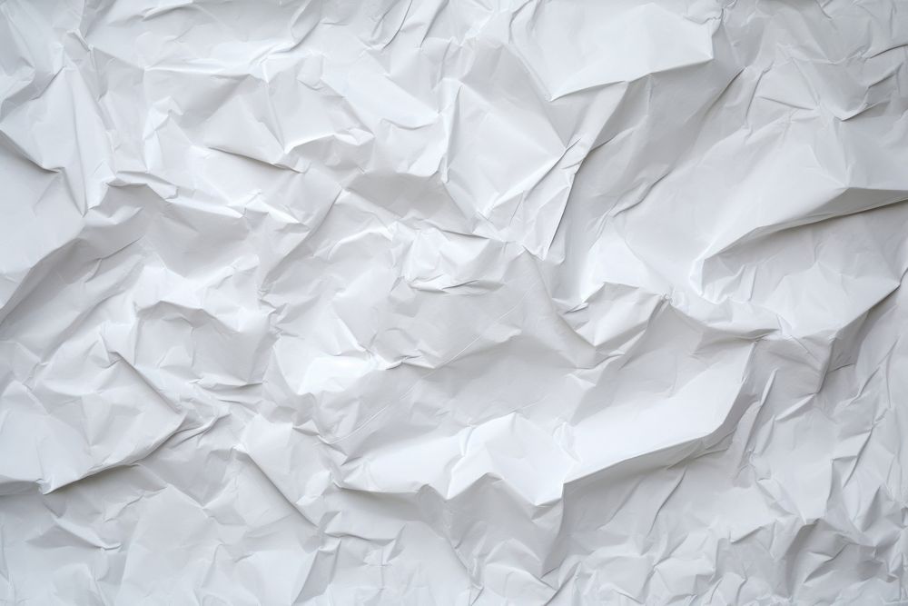 Crumpled Paper Texture paper backgrounds crumpled. AI generated Image by rawpixel.