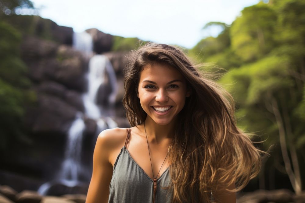 Brazilian woman outdoors waterfall portrait.