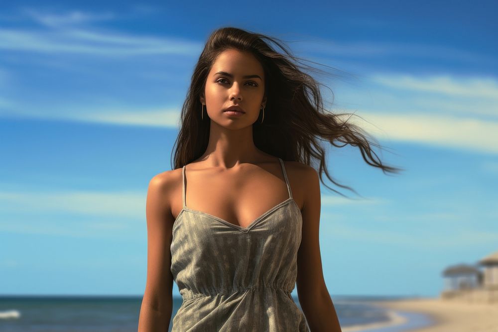 Latina walking on the beach outdoors swimwear portrait.