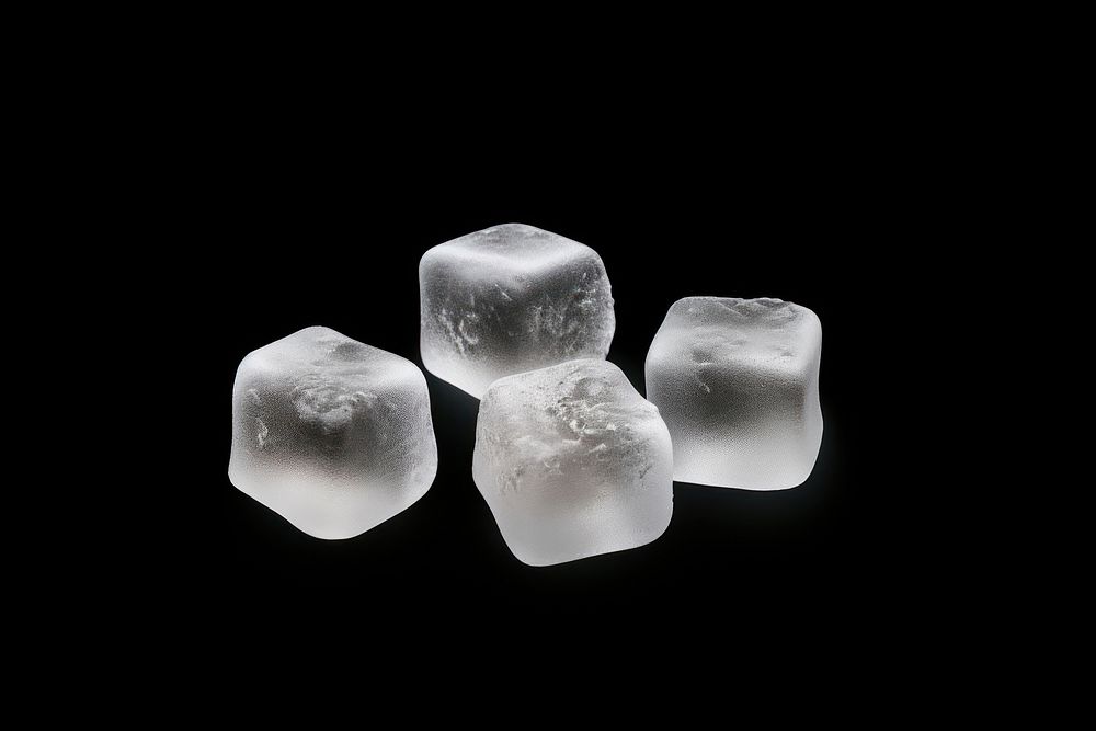 Frosted ice dices crystal frozen black background.