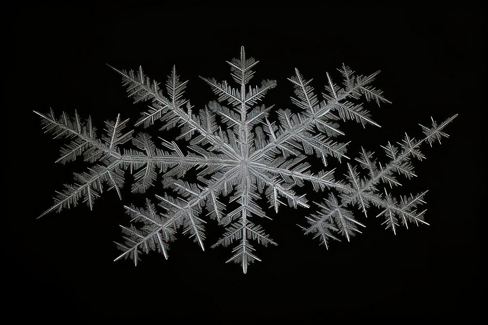 Frosted ice frame snowflake winter black background.