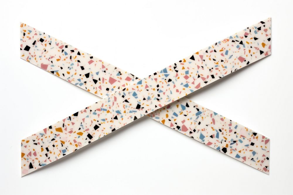 Classic terrazzo pattern adhesive strip white background accessories accessory. AI generated Image by rawpixel.