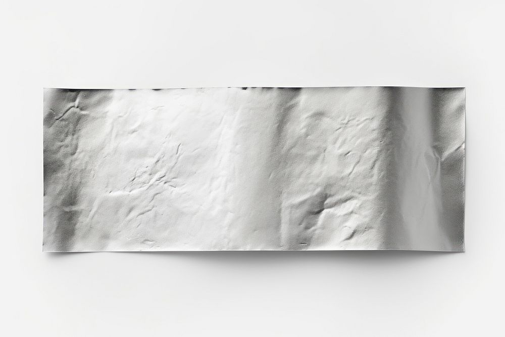 Glossy platinum foil adhesive strip backgrounds white paper. AI generated Image by rawpixel.