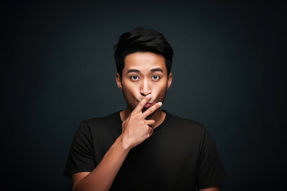 Man keep quiet gesture portrait photo gray. AI generated Image by rawpixel.